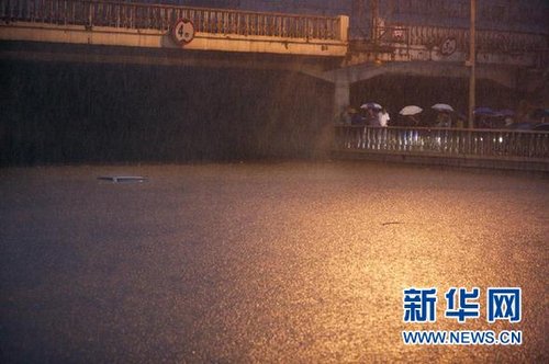 新华视点：61年最强暴雨考验了什么？